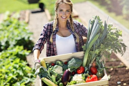 home gardener with fruit and vegetables